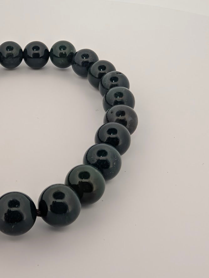 Detail of Dark Moss Agate bracelet highlighting deep green tones