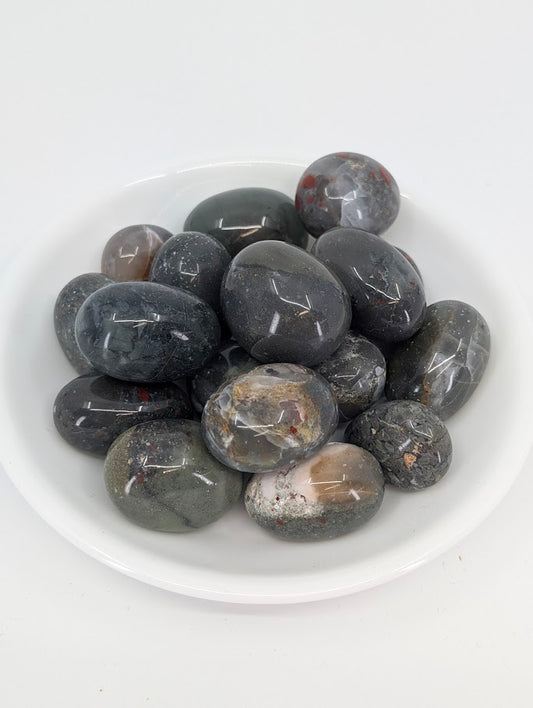 Dragon Blood Jasper tumbled stones A grade in bowl