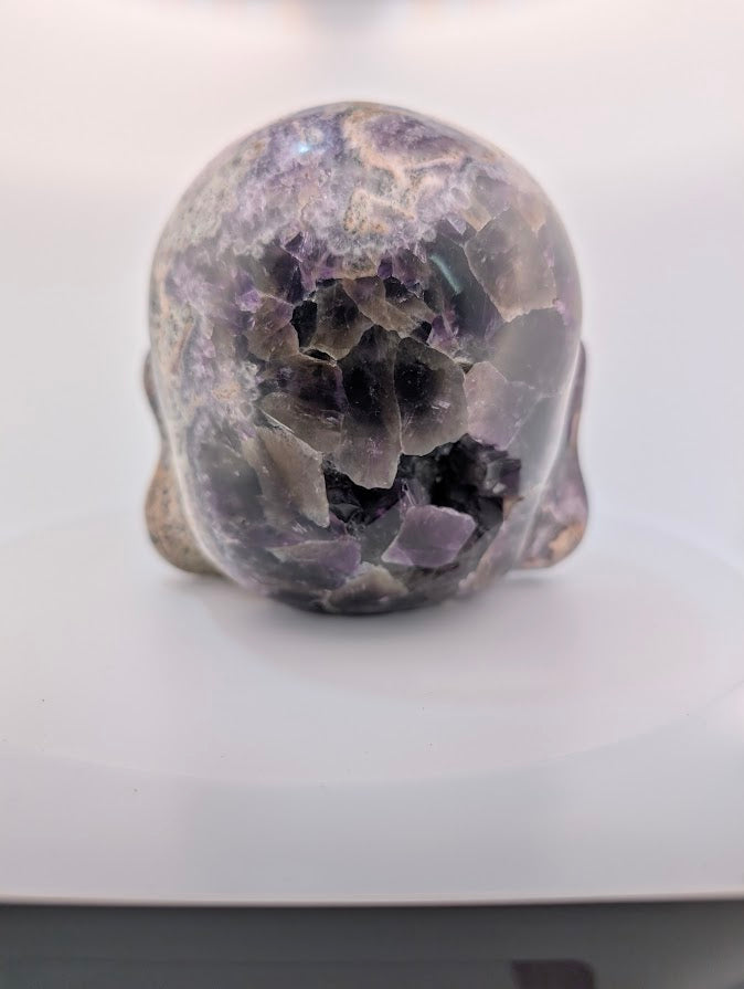 Rear view of carving with open amethyst vug and natural crystal terminations