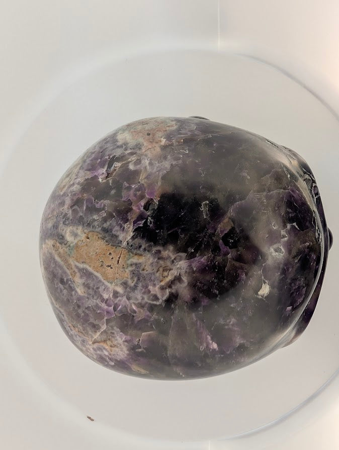 Top view showing banded amethyst pattern and polished contours