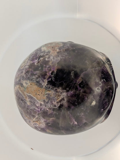 Top view showing banded amethyst pattern and polished contours
