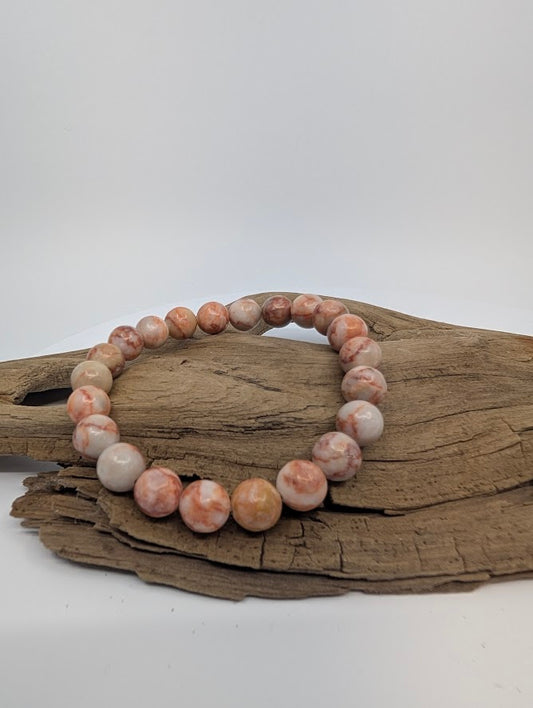 Red Vein Jasper 8mm beaded bracelet on driftwood – Legacy Crystals and Minerals