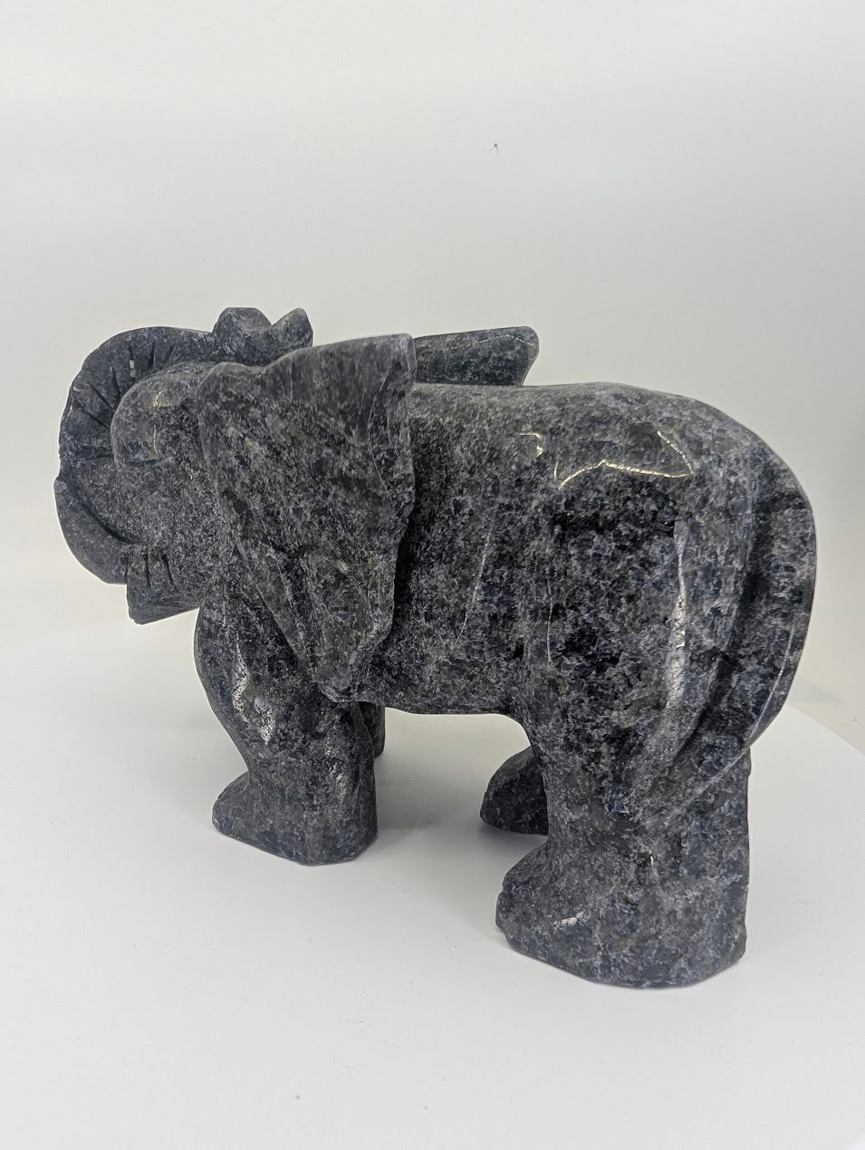 Back angled view showing emerald + iolite matrix