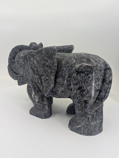 Back angled view showing emerald + iolite matrix