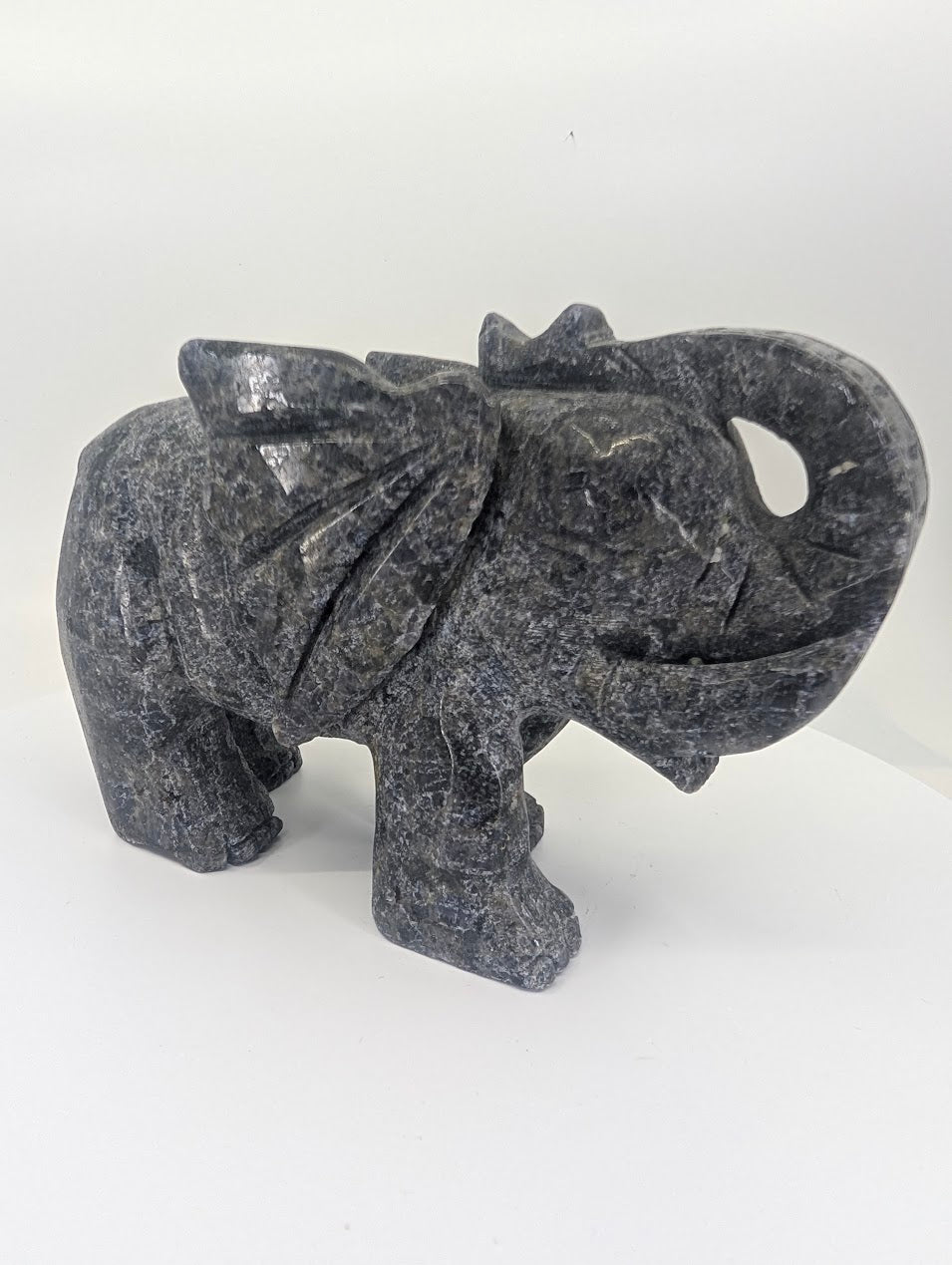 Emerald and Iolite matrix elephant carving, 985 g, front view