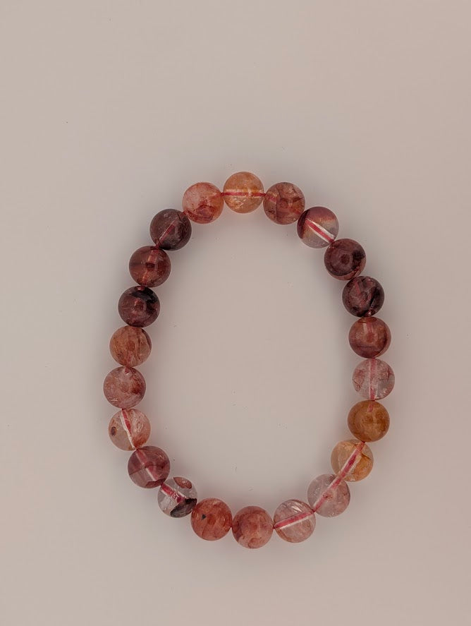Top view of Fire Quartz 8MM round bead stretch bracelet