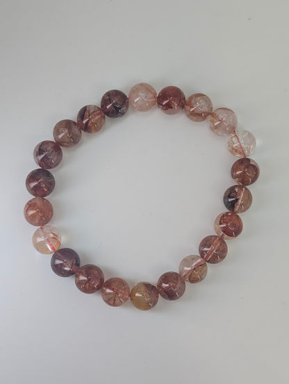 Natural Fire Quartz round beads with strong transparency and fiery inclusions