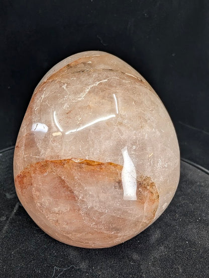 Back view of Fire Quartz skull showing internal zoning and iron oxide band