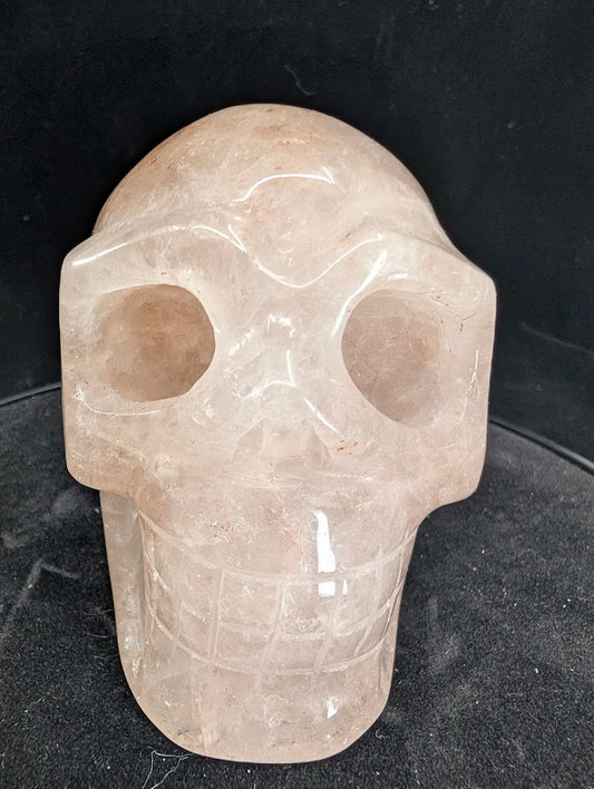 Fire Quartz skull, alternate front view with internal red-orange inclusions