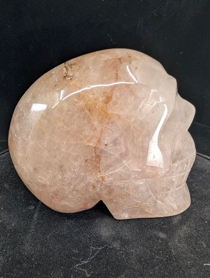 Left profile of Fire Quartz skull with translucent quartz and warm inclusions