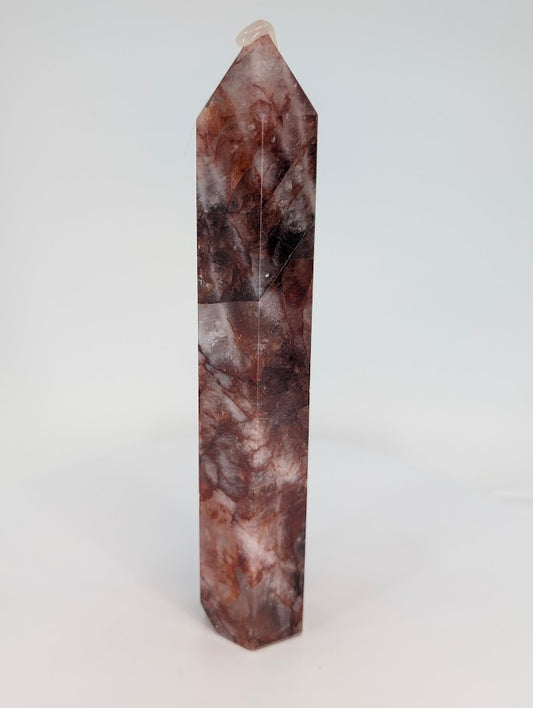 Hematoid Quartz tower showing deep hematite veils