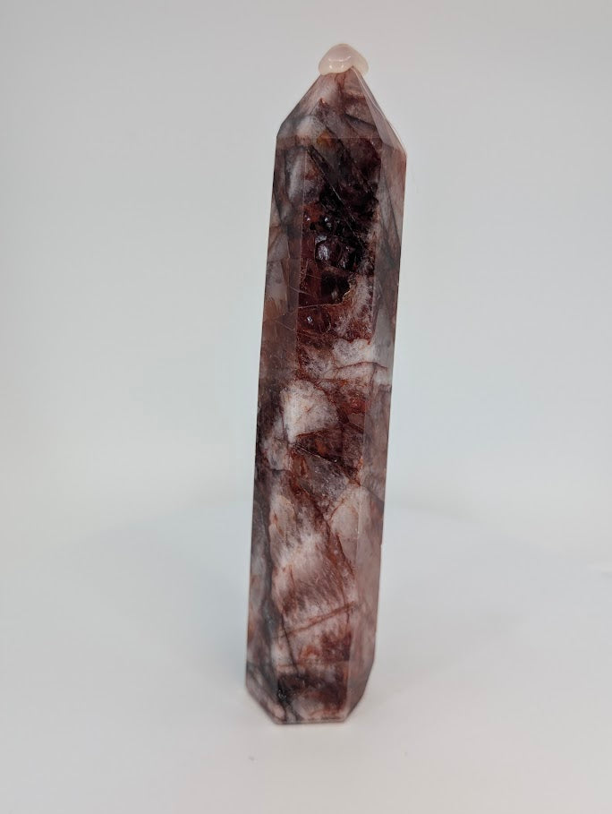Fire Quartz tower – translucent red and smoky patterns