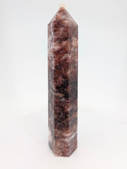 Fire Quartz tower – angled view with hematite inclusions