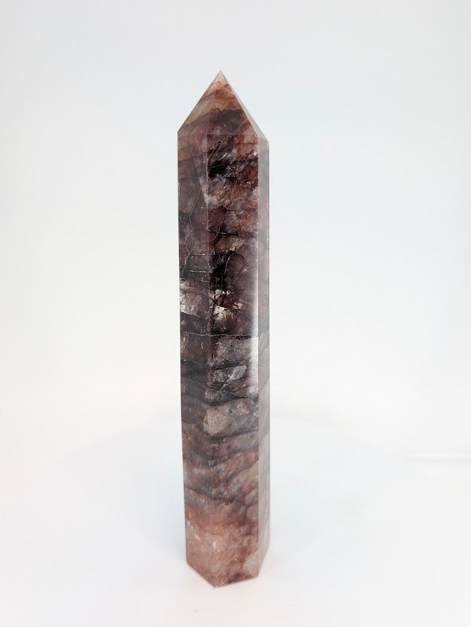 Hematoid Quartz tower with layered hematite veils