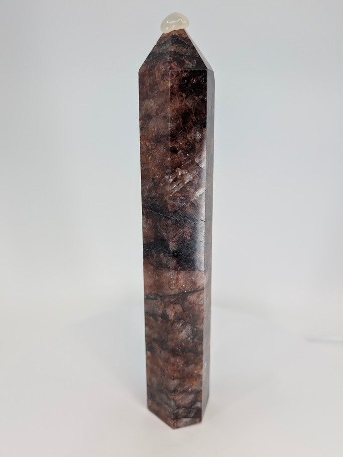 Fire Quartz tower – backlit glow highlighting red inclusions