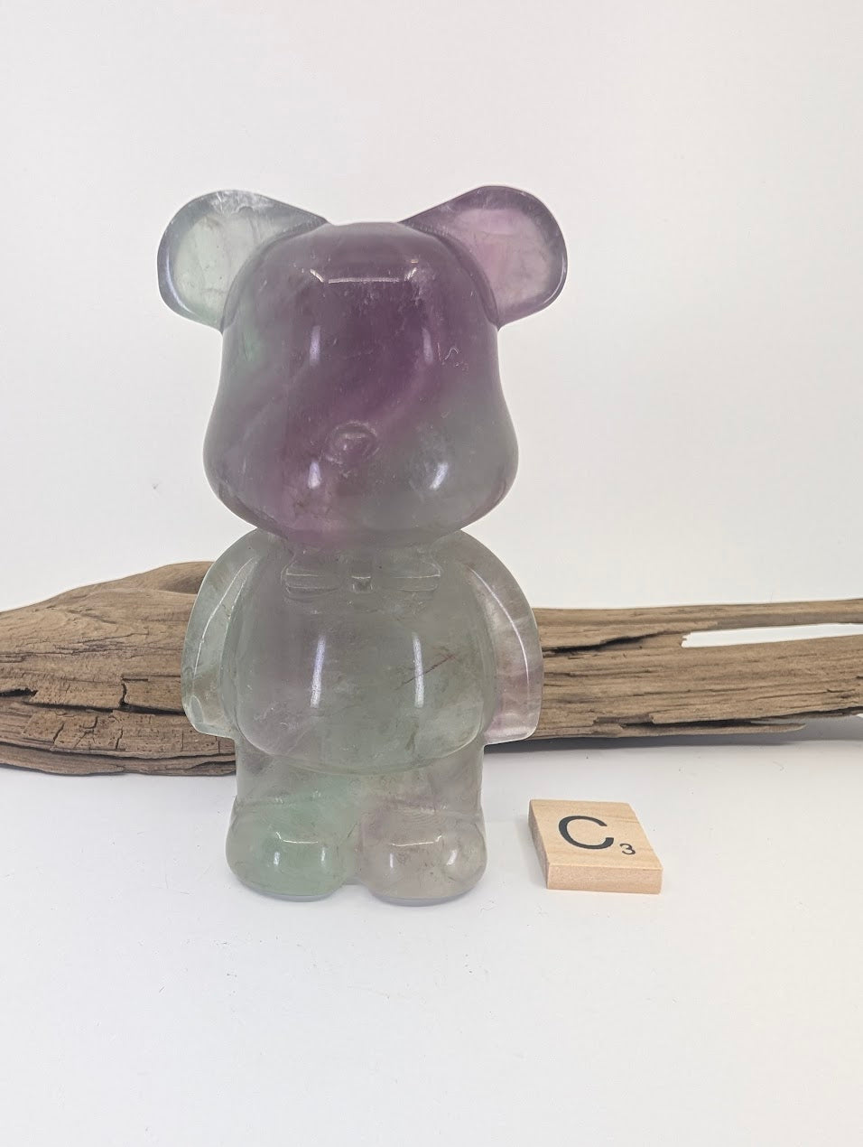 Exact-piece Rainbow Fluorite bear carving specimen C featuring purple face and green base.