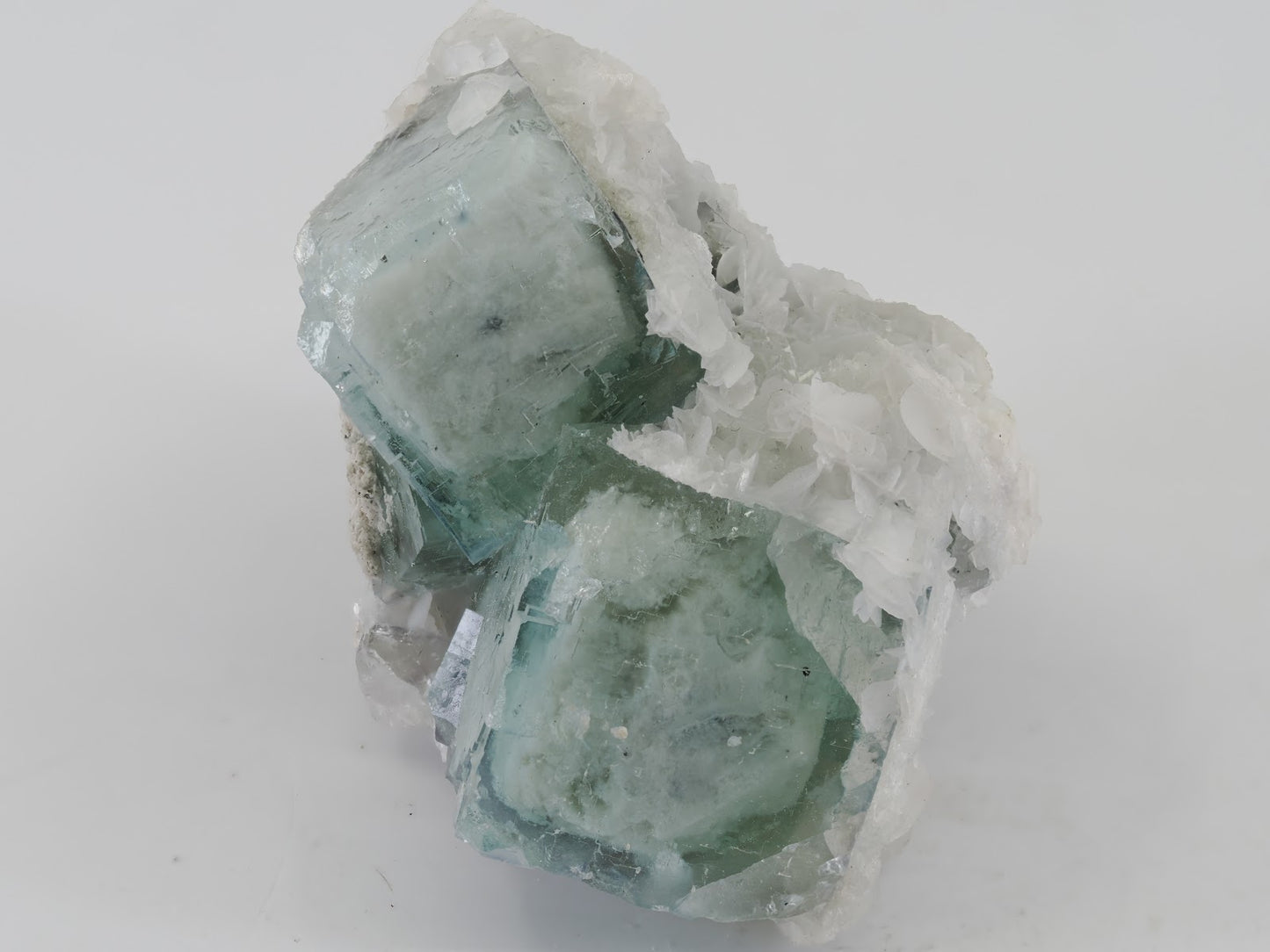 Angled perspective of collector-grade Porcelain Fluorite on bladed barite matrix from the legendary Yaogangxian Mine.