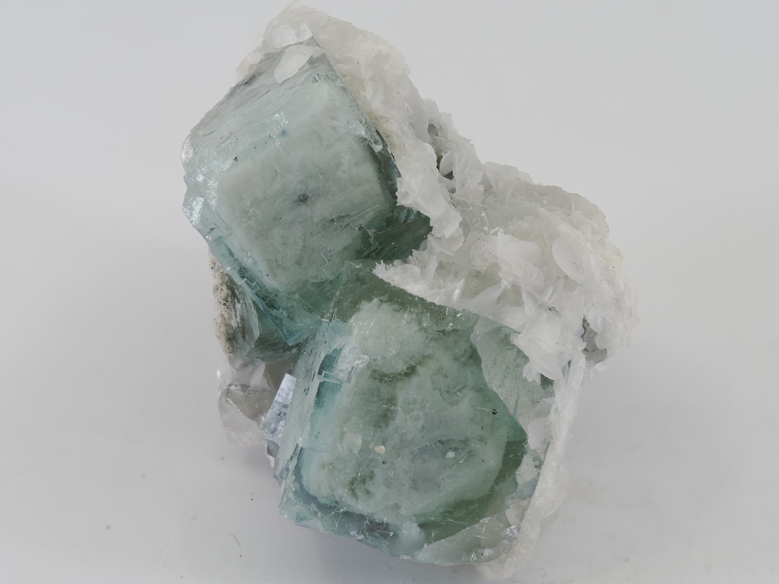 Angled perspective of collector-grade Porcelain Fluorite on bladed barite matrix from the legendary Yaogangxian Mine.