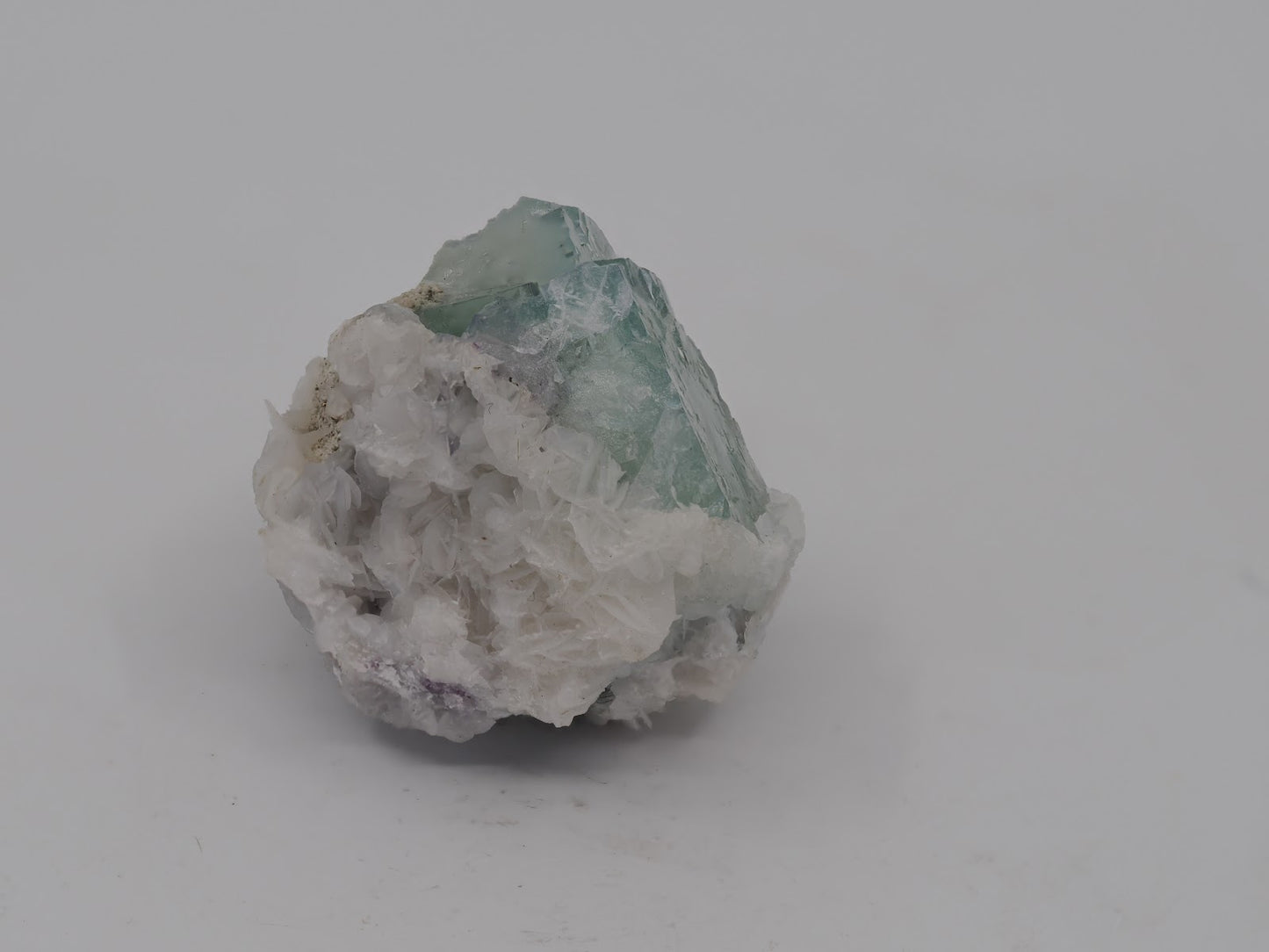 Side profile of YGX Porcelain Fluorite highlighting the transition between late second and early third-generation growth stages.