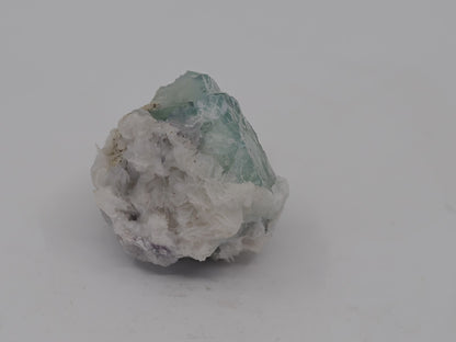 Side profile of YGX Porcelain Fluorite highlighting the transition between late second and early third-generation growth stages.