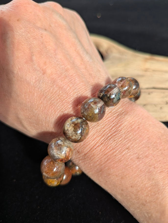 13mm AA Grade Four Season Garden Quartz beaded stretch bracelet worn on a wrist.