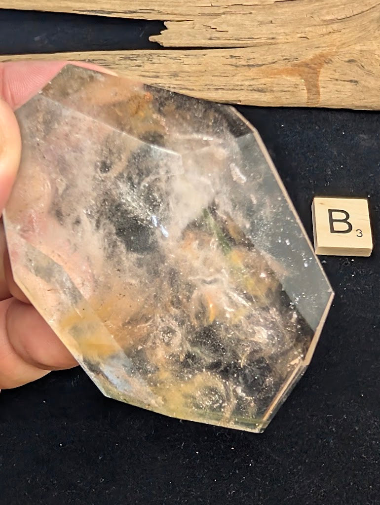 Reverse view of exact piece Garden Quartz faceted freeform, Variant B3, detailing natural mineral inclusions.