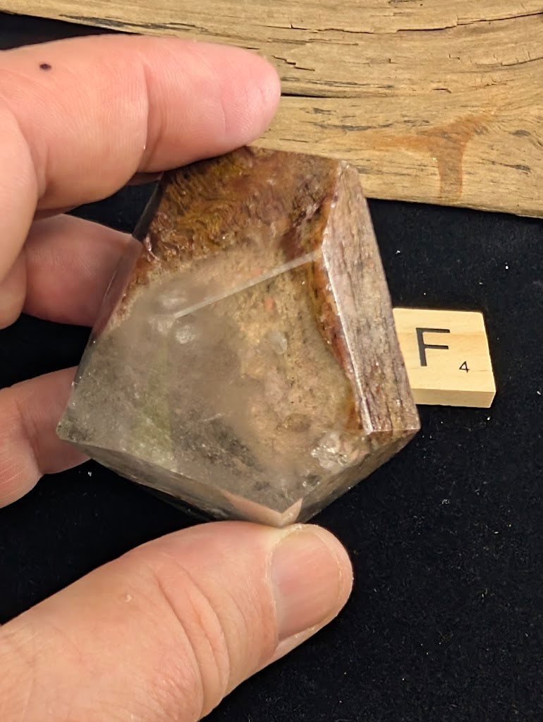Reverse view of exact piece Garden Quartz faceted freeform, Variant F4, showing the texture of the iron oxide layers.