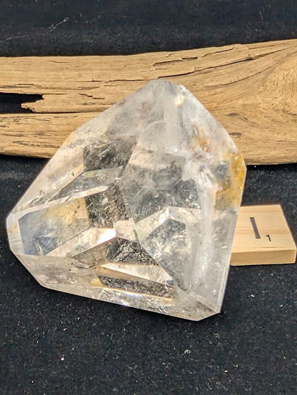 Angled view of exact piece Garden Quartz faceted freeform, Variant I1, showcasing the optical windows.