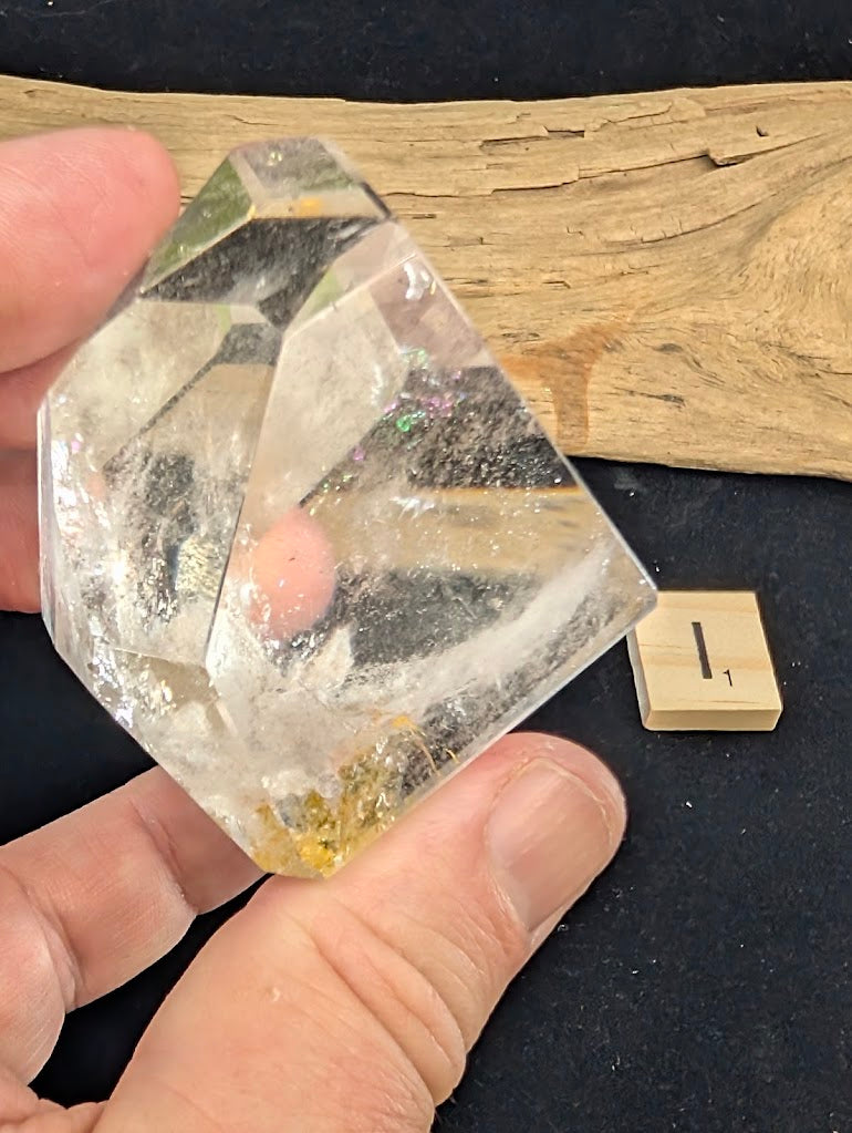 Reverse view of exact piece Garden Quartz faceted freeform, Variant I1, detailing the suspended mineral inclusions.