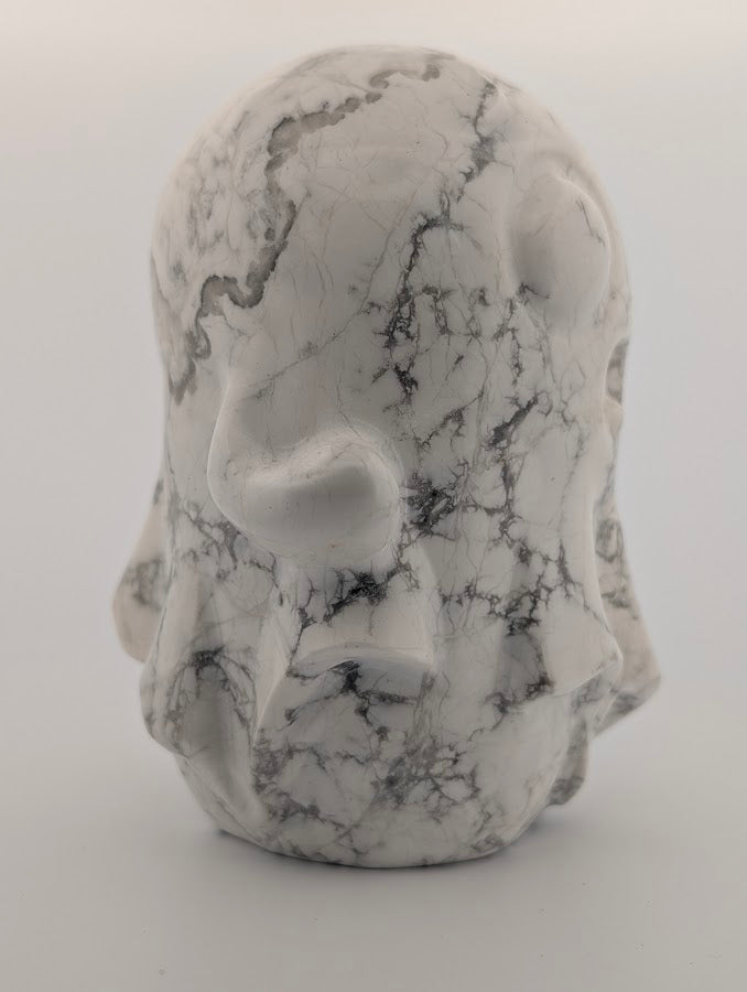 Hand-carved White Howlite ghost with grey veining, 4x3 inches, 600g