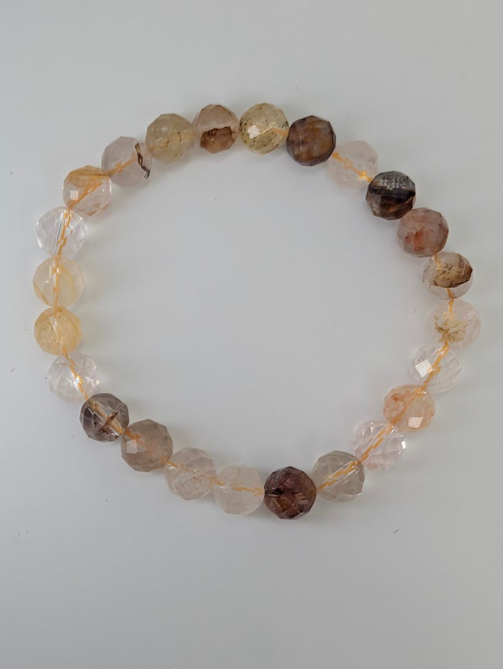 Faceted Golden Healer Quartz bracelet with transparent and amber beads