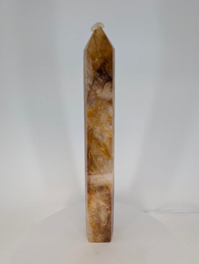 Tall Golden Healer Quartz Tower 29.5 cm Brazilian polished surface