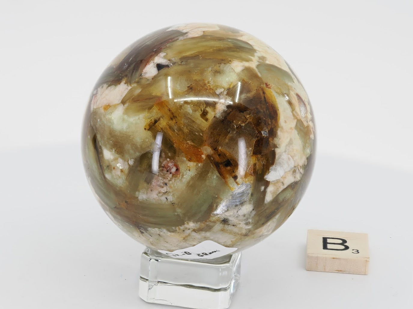 Exact-piece B: 68mm Golden Mica sphere featuring a mix of gold and olive-green mica plates with a clear quartz matrix.