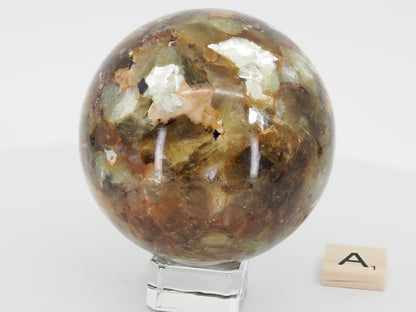 Exact-piece A: 68mm Golden Mica sphere with dense metallic Phlogopite layers and high-luster bronze chatoyancy.