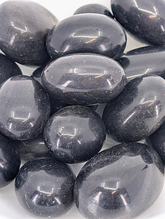 Close-up of Golden Obsidian showing golden sheen and polish