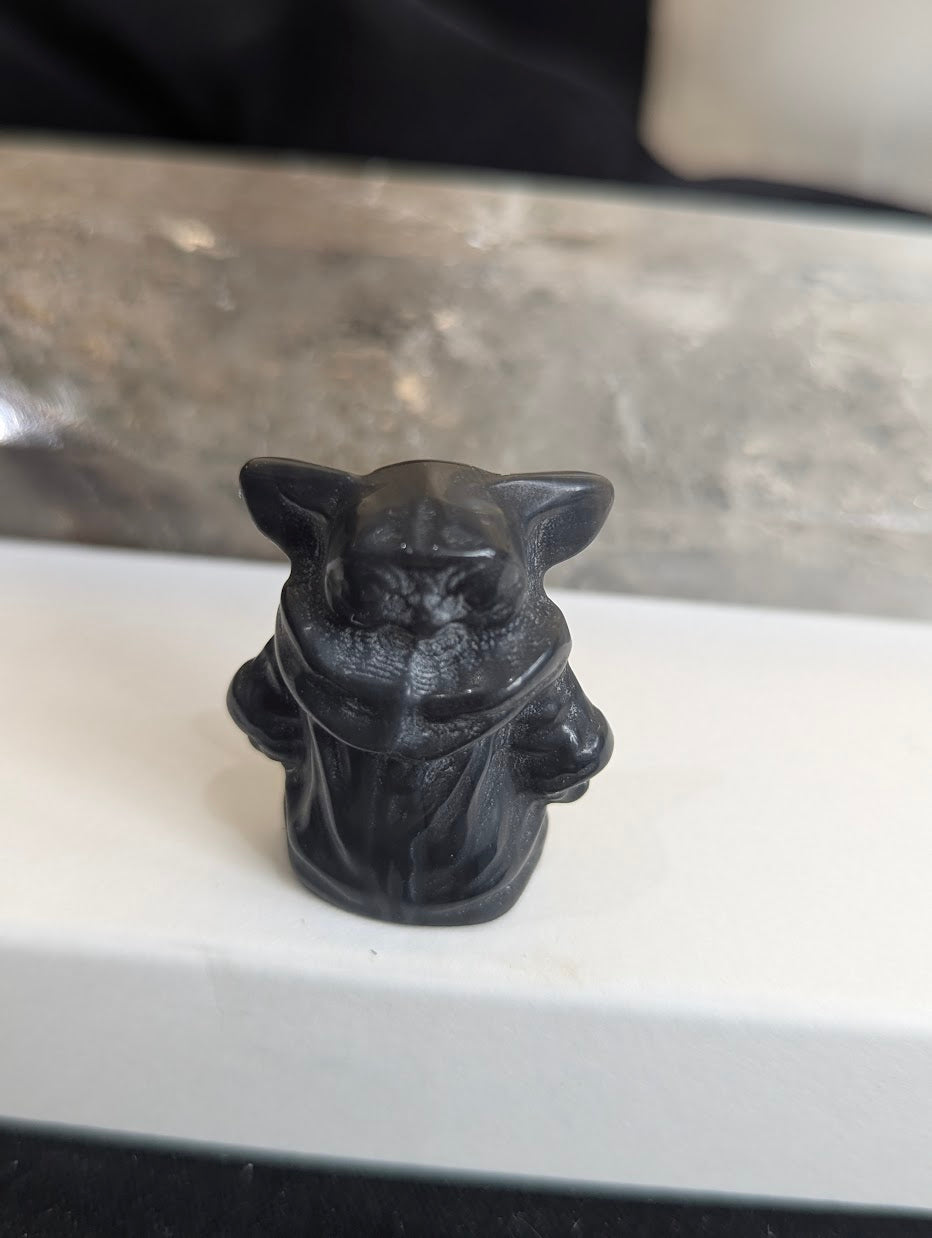 Front view of a 3cm Gorku carved from natural matte Black Obsidian.