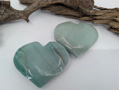 Pair of large Green Aventurine hearts showing soft mint and sage colors.