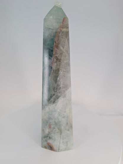 Green Fluorite with Quartz and Iron Inclusions tower – front view, 21.5 cm
