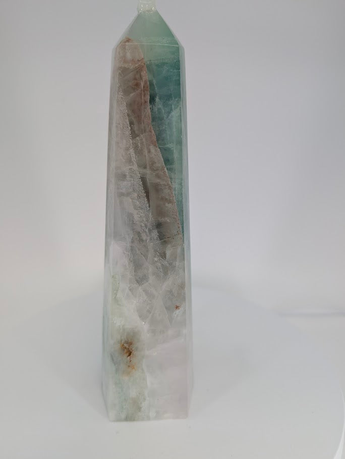 Green Fluorite tower – angled view of inclusions and clarity