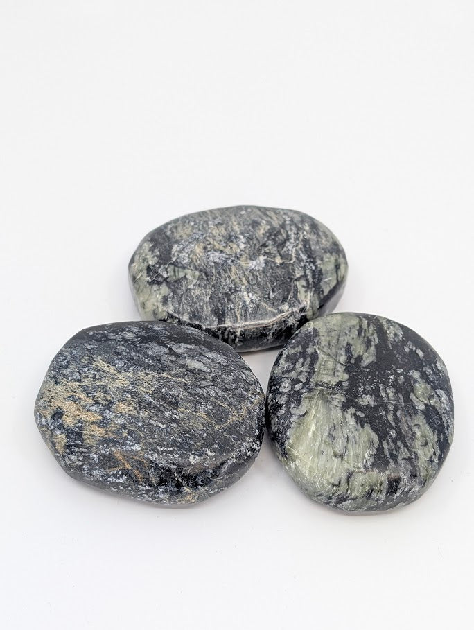 Group of Green Jade Palm Stones showing deep green and black veining