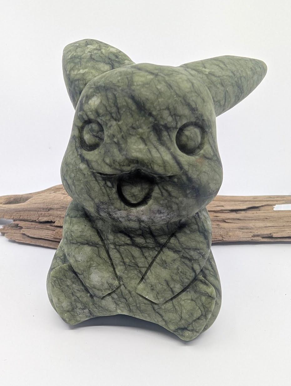 Front view of a large 785g Green Nephrite Jade Pikachu carving with an open mouth and alert ears.