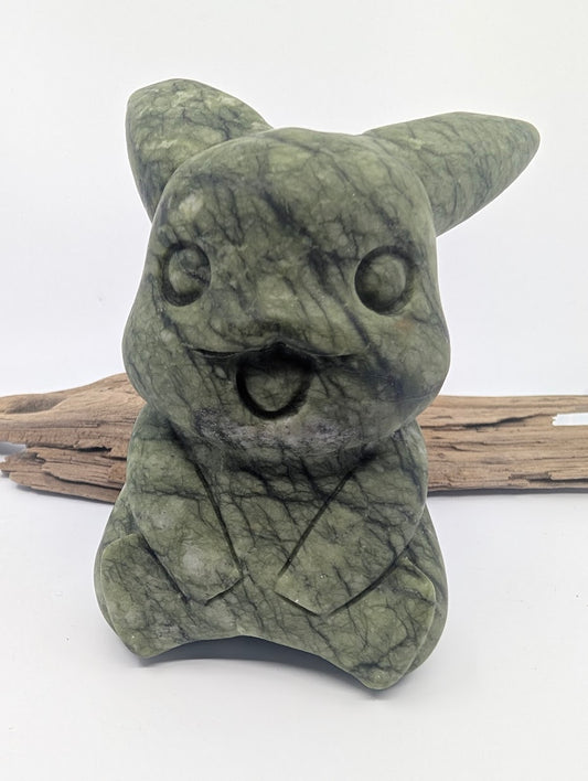 Front view of a large 785g Green Nephrite Jade Pikachu carving with an open mouth and alert ears.