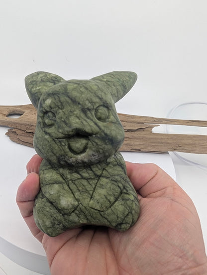 785g Green Jade Pikachu held in hand to show significant scale and solid Nephrite structure.
