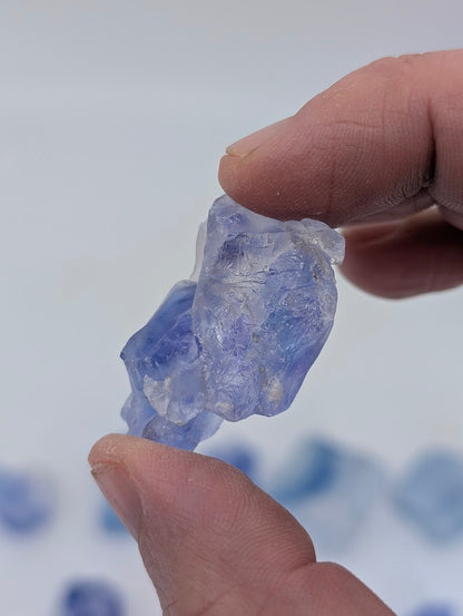 Blue halite piece with internal banding and translucent faces