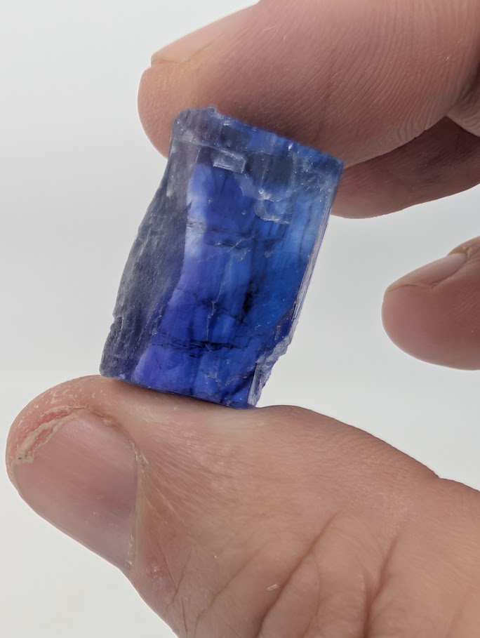 Vivid blue halite micro specimen with concentrated color center