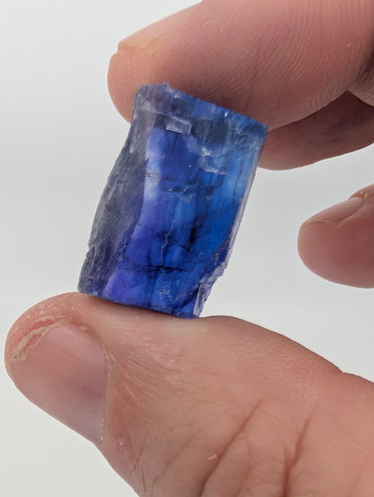 Vivid blue halite micro specimen with concentrated color center