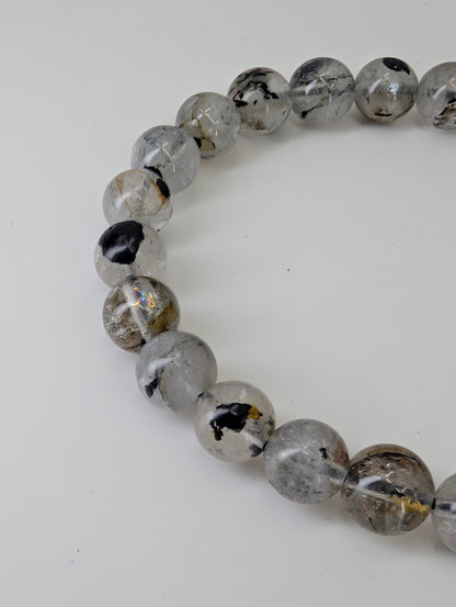 Close-up of Herkimer style quartz bracelet displaying clarity and inclusions