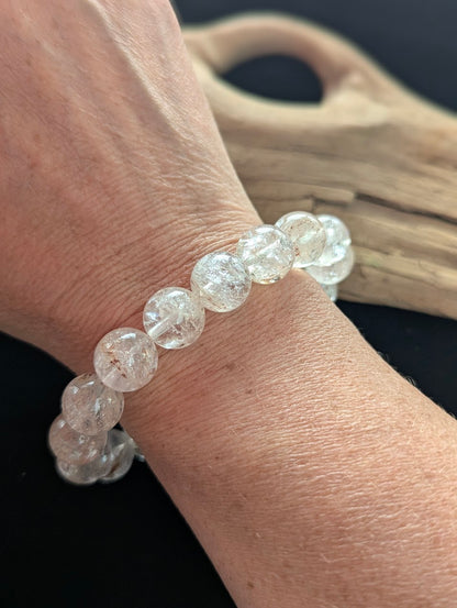12mm AAA Grade Himalayan Garden Quartz beaded stretch bracelet worn on a wrist.