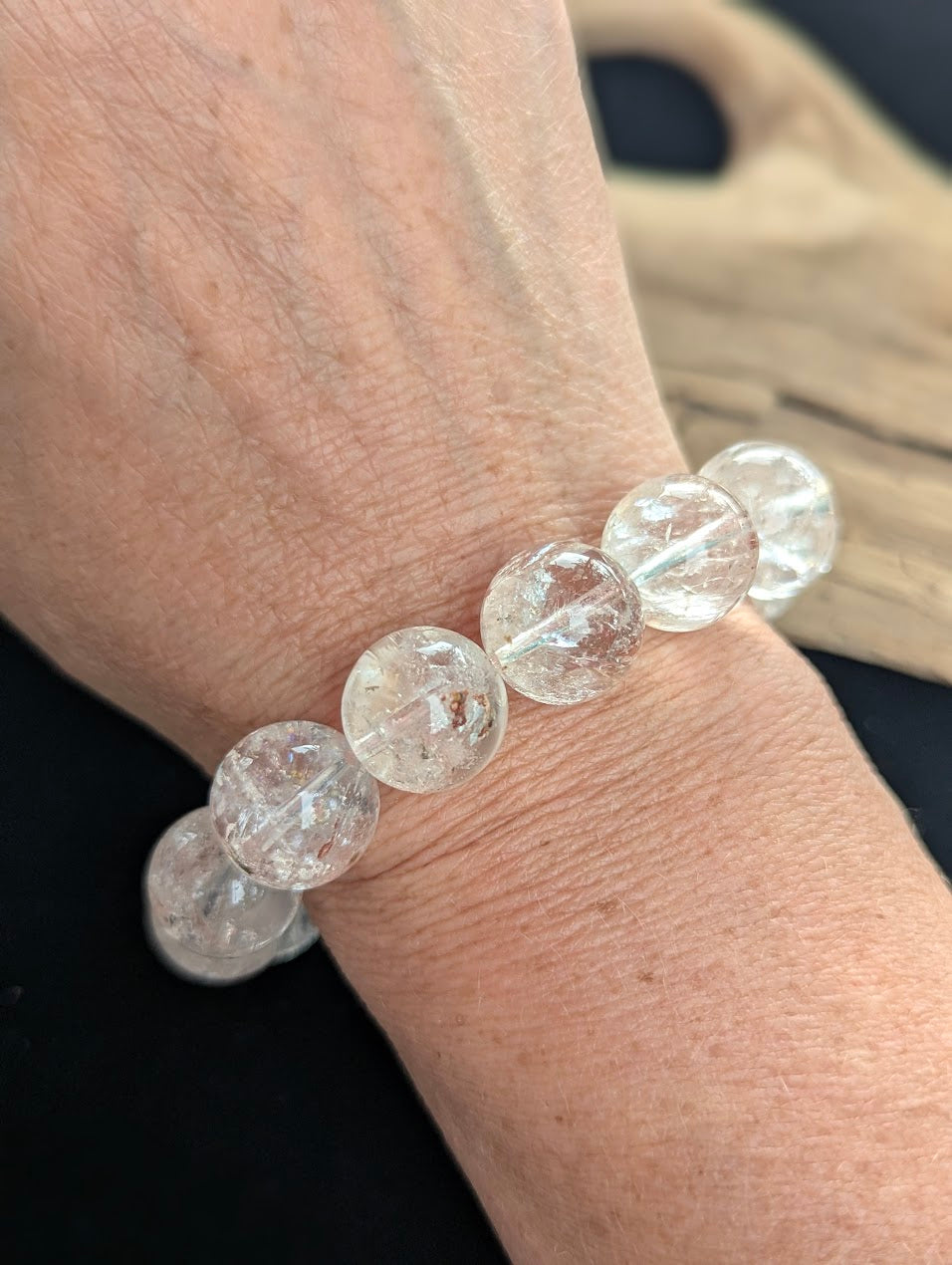 14mm statement AAA Grade Himalayan Garden Quartz beaded stretch bracelet worn on a wrist for scale demonstration.