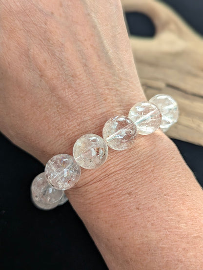 14mm statement AAA Grade Himalayan Garden Quartz beaded stretch bracelet worn on a wrist for scale demonstration.